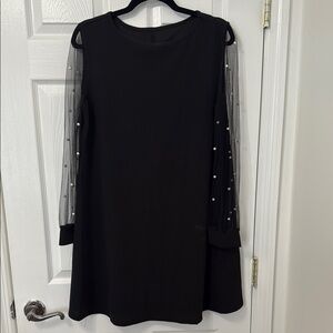 Elegant Black Dress with Pearl-Embellished Sleeves